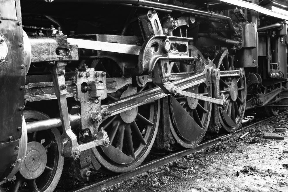 Black and white close up of a steam train
