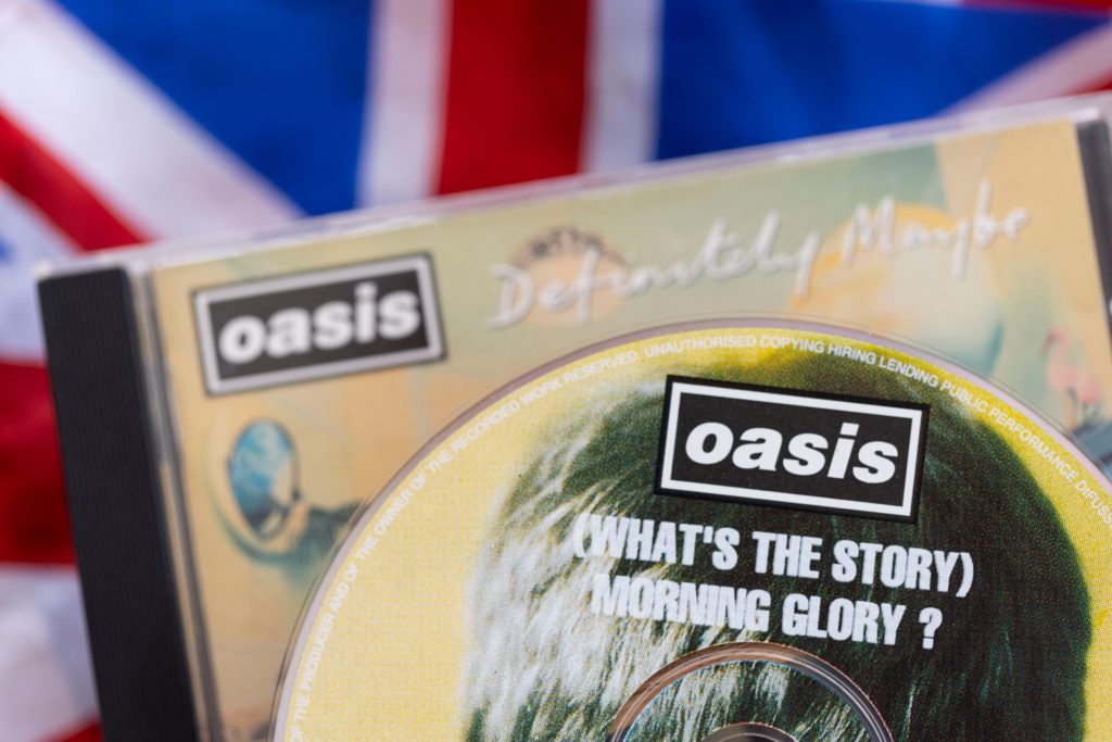 Close up of oasis album and cd