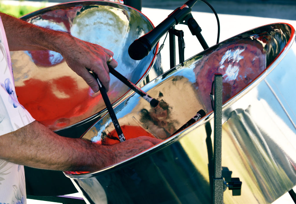 A man playing steel drums.